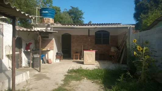 Vende SE Terreno com Quitinete