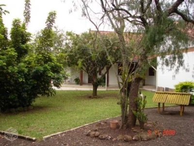 Casa com 4 Dorms em Taquara - Km4 por 1.1 Milhões para Comprar