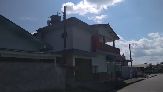 Terreno com Sobrado e Duas Casas