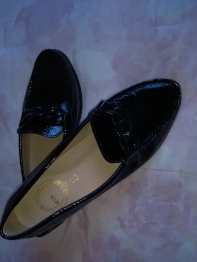 Sapatos em Couro de